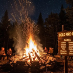 Campfire burning at dusk with sparks rising, a setting that inspires fire names